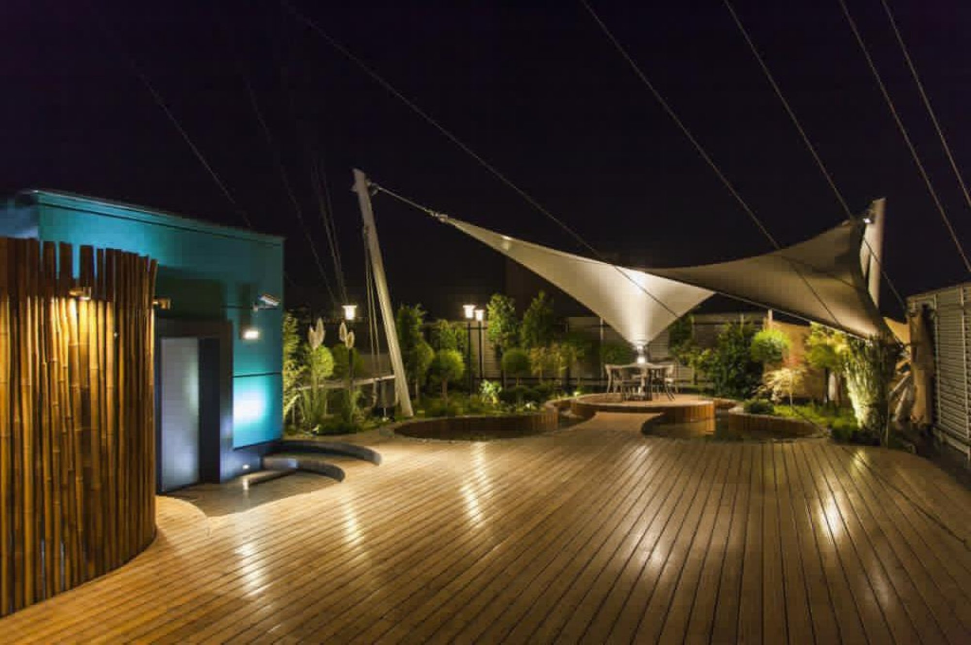 Garden pool lit at night